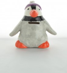 tirelire pingouin en faïence avec un bonnet moineaux & co