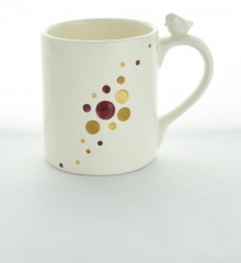 Mug cosmique oiseau sur l'anse.