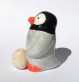 Figurine pingouin qui couve son œuf en faïence - poterie