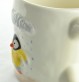 Mug XL Pingouin ciré jaune sous la pluie - céramique artisanale Moineaux & Co à Quimper