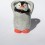 Figurine pingouin qui mange un poisson en faïence - poterie