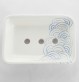 Porte-savon format rectangle. Décor gravé de vagues d'inspiration japonaise.