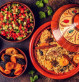 Traditional moroccan tajine of chicken with dried fruits and spices, top view.